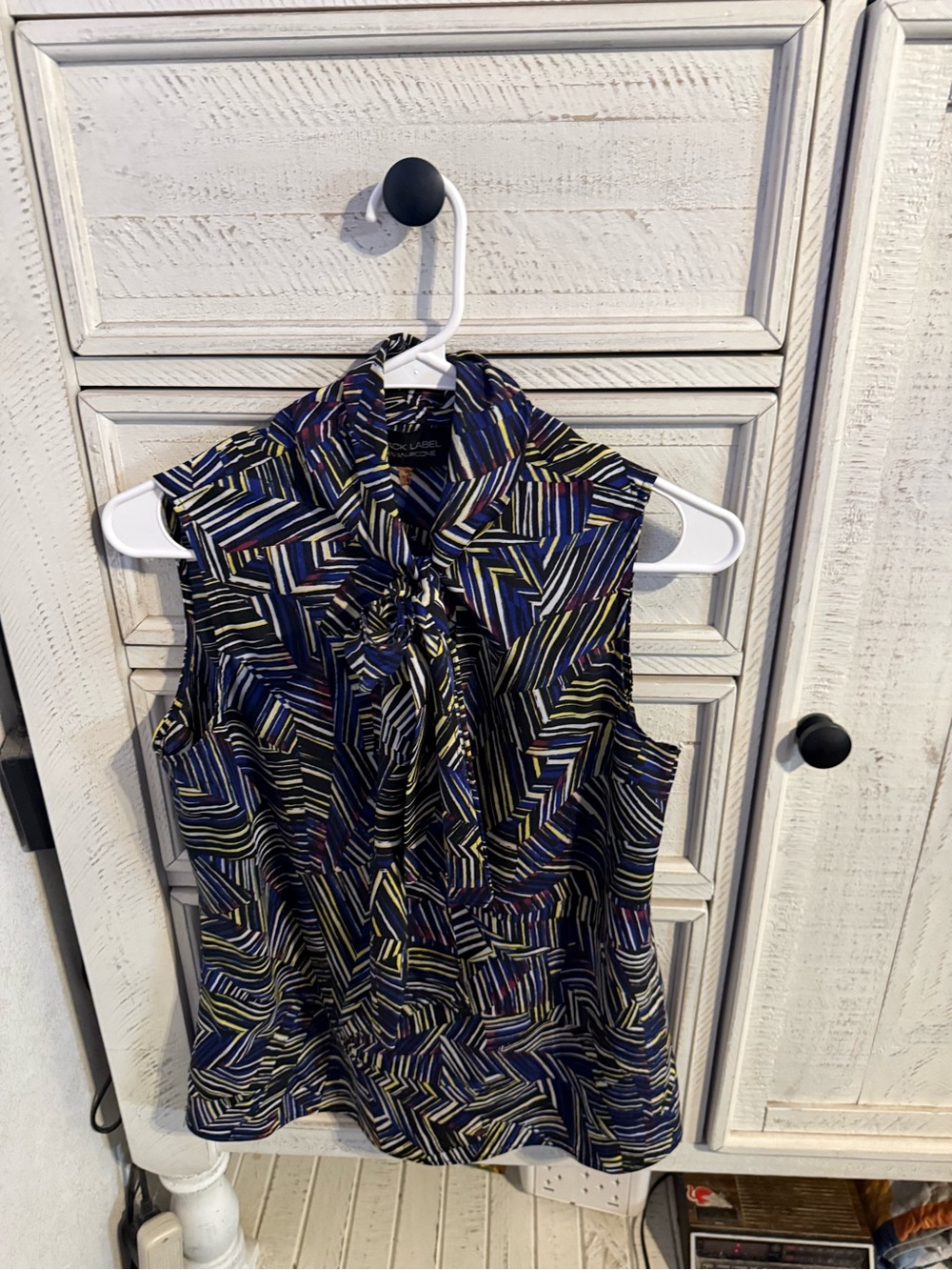 Sleeveless Tie-Neck Blouse in Navy Geometric Print